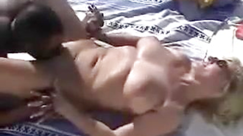Vacationing MILF beauty surrenders to black cocks