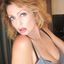 Big boobs mature lady teasing the cam in a solo gallery