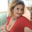 Big boobs mature lady teasing the cam in a solo gallery