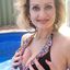 Big boobs mature lady teasing the cam in a solo gallery