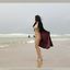 Bib boobed babe showing her body on the beach
