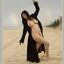 Bib boobed babe showing her body on the beach