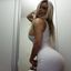 Hot lady with sexy curves teasing in an amateur gallery