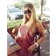 Hot lady with sexy curves teasing in an amateur gallery