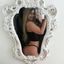 Hot lady with sexy curves teasing in an amateur gallery