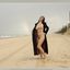Bib boobed babe showing her body on the beach