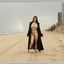 Bib boobed babe showing her body on the beach