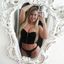 Hot lady with sexy curves teasing in an amateur gallery