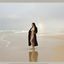 Bib boobed babe showing her body on the beach