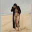 Bib boobed babe showing her body on the beach