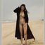 Bib boobed babe showing her body on the beach