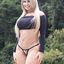 Hot lady with sexy curves teasing in an amateur gallery