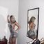 Hot lady with sexy curves teasing in an amateur gallery