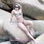 Hot lady with sexy curves teasing in an amateur gallery