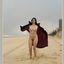 Bib boobed babe showing her body on the beach