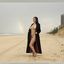 Bib boobed babe showing her body on the beach