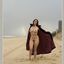 Bib boobed babe showing her body on the beach