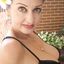 Big boobs mature lady teasing the cam in a solo gallery
