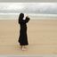 Bib boobed babe showing her body on the beach
