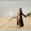 Bib boobed babe showing her body on the beach