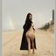 Bib boobed babe showing her body on the beach